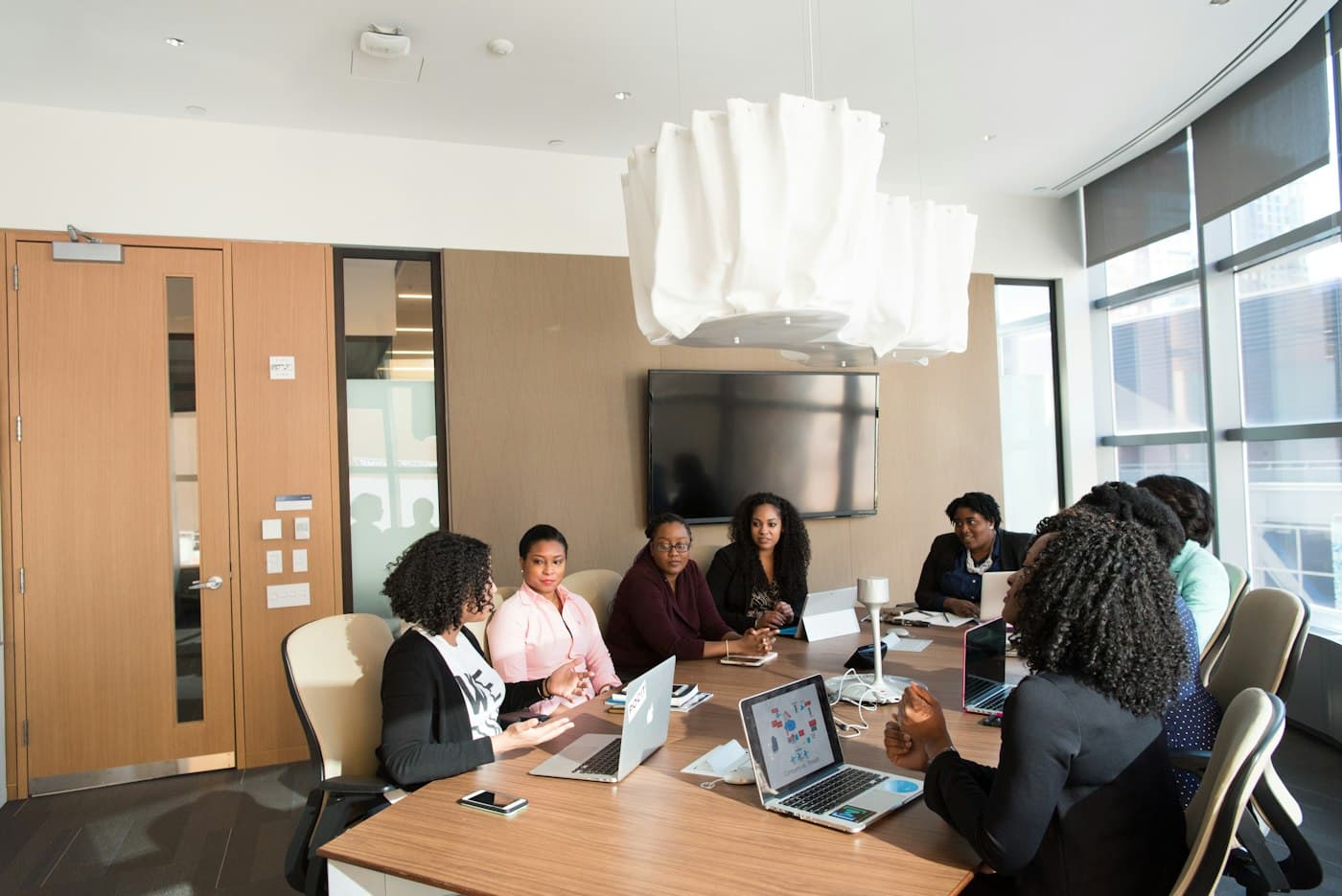 Colleagues meeting around a conference table